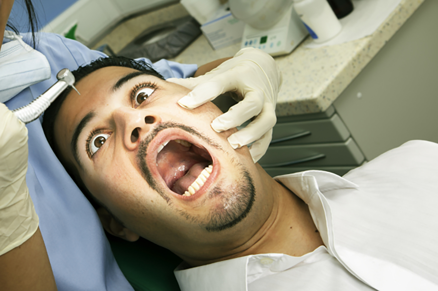 apprehensive dental patient as the drill comes near