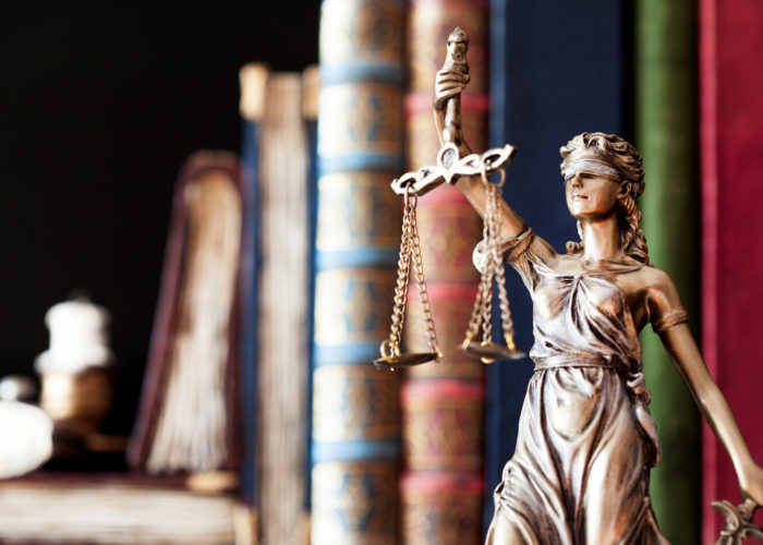 law books and the scales of justice