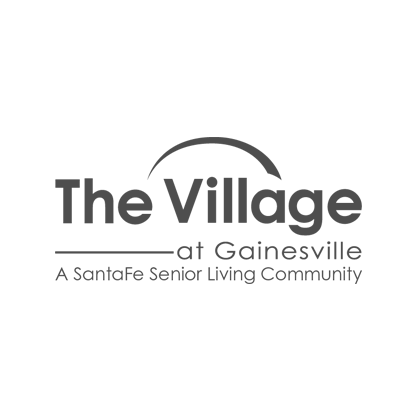 the village at gainesville retirement community logo