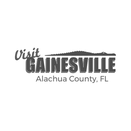 visit gainesville alachua county logo